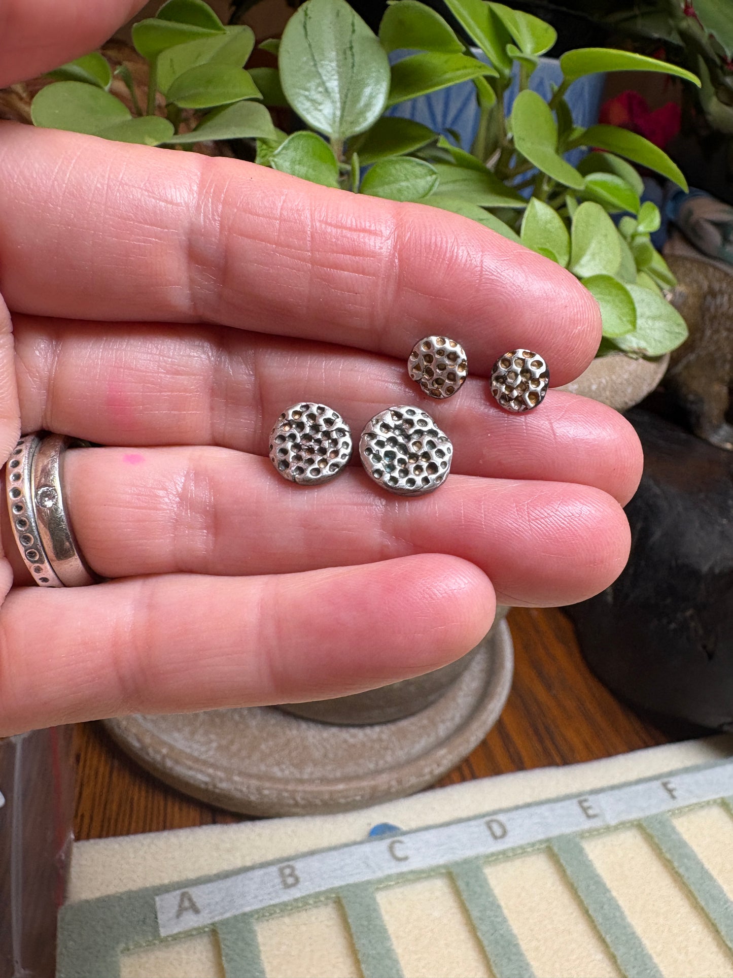 Sterling silver studs.