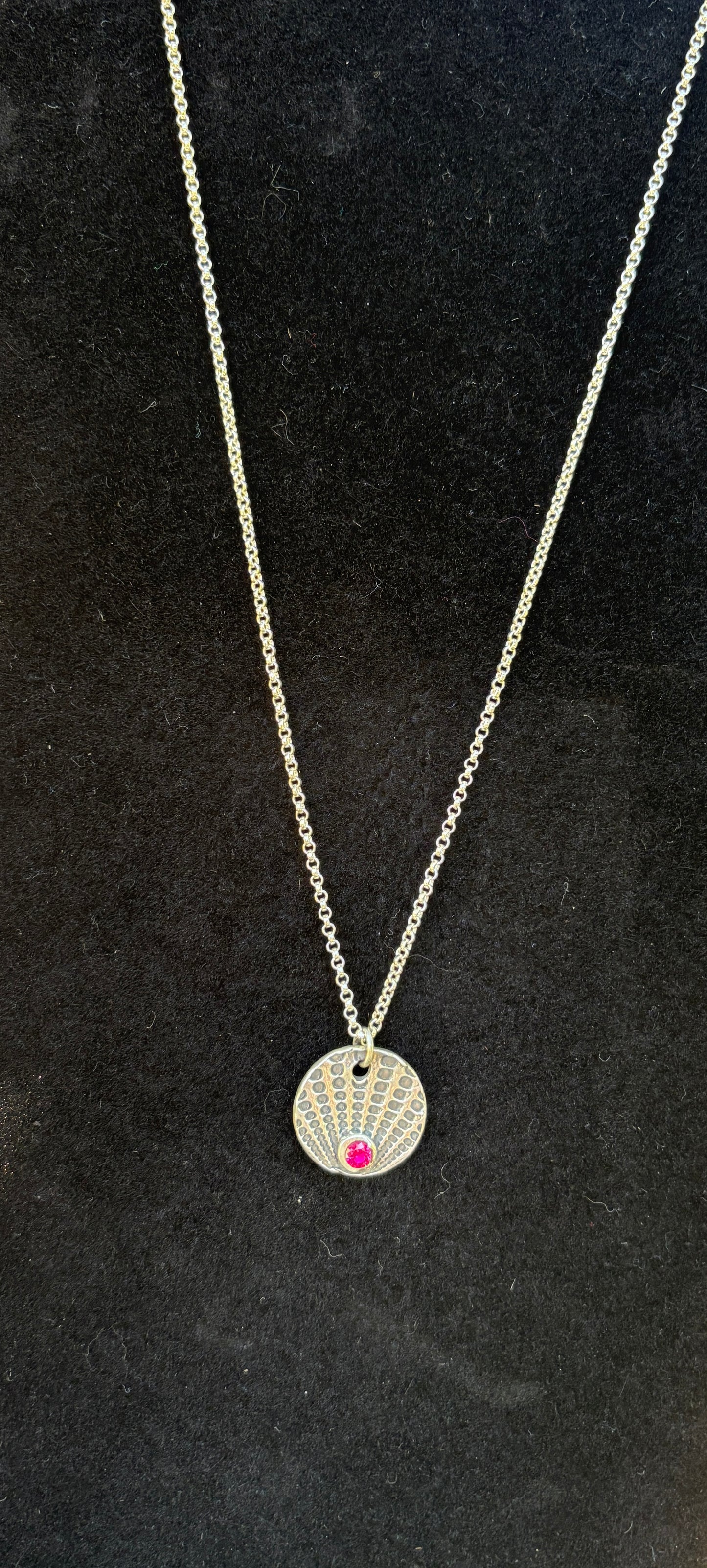 Sterling silver pendant.