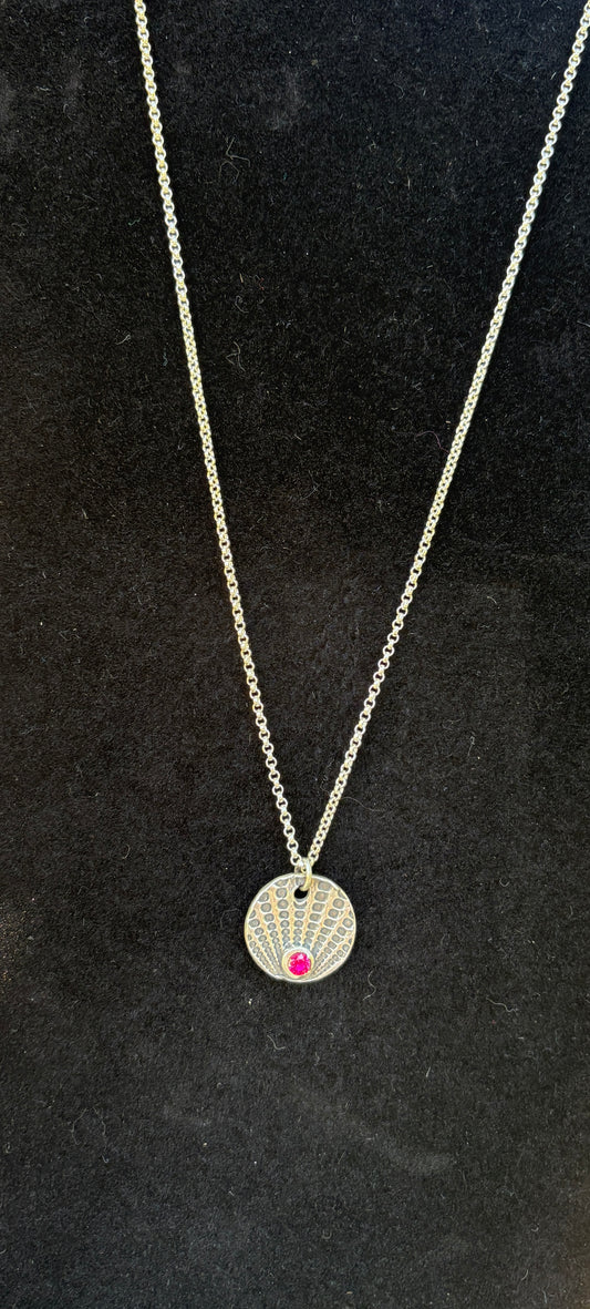 Sterling silver pendant.