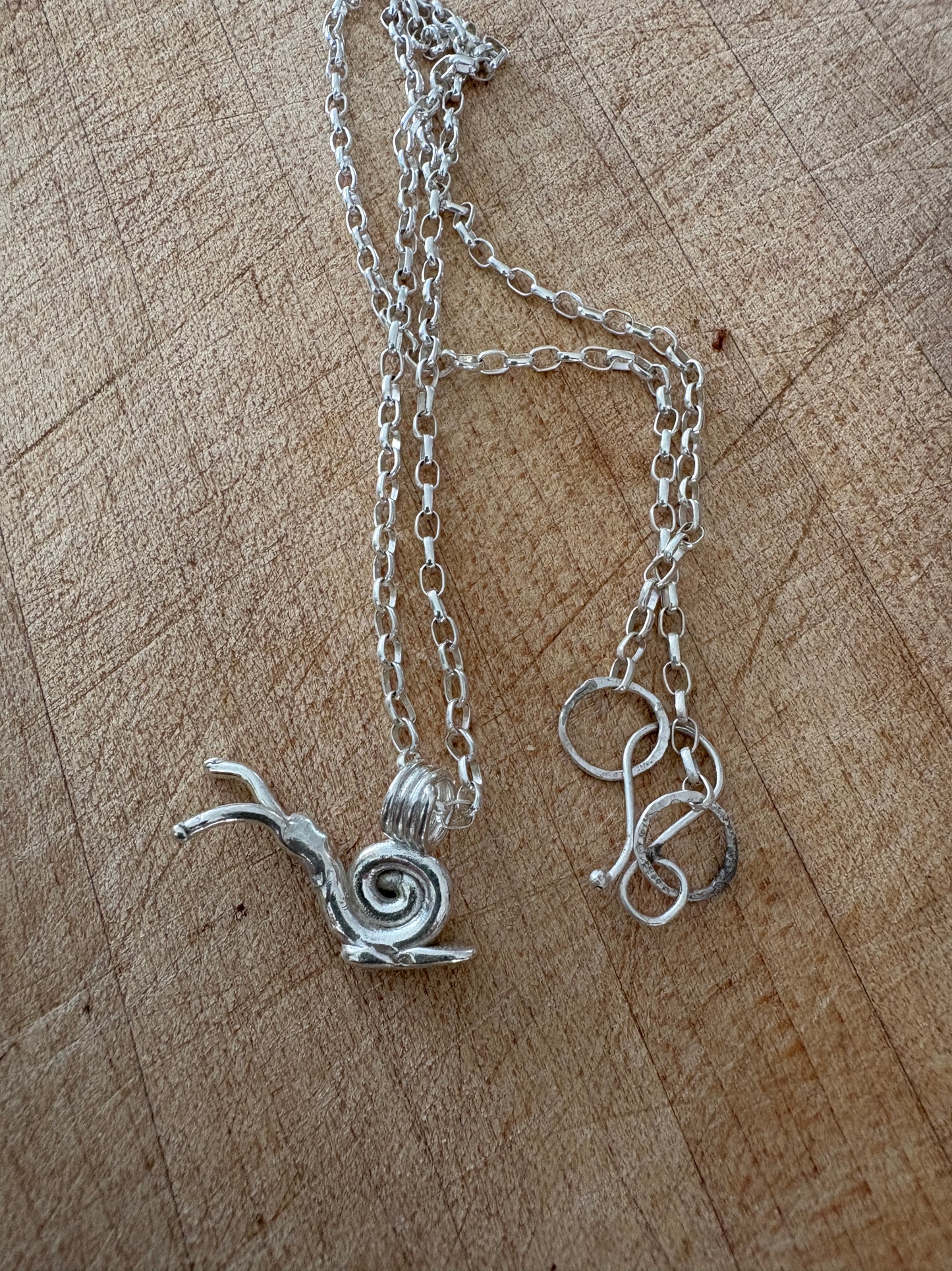 Snail charm necklace