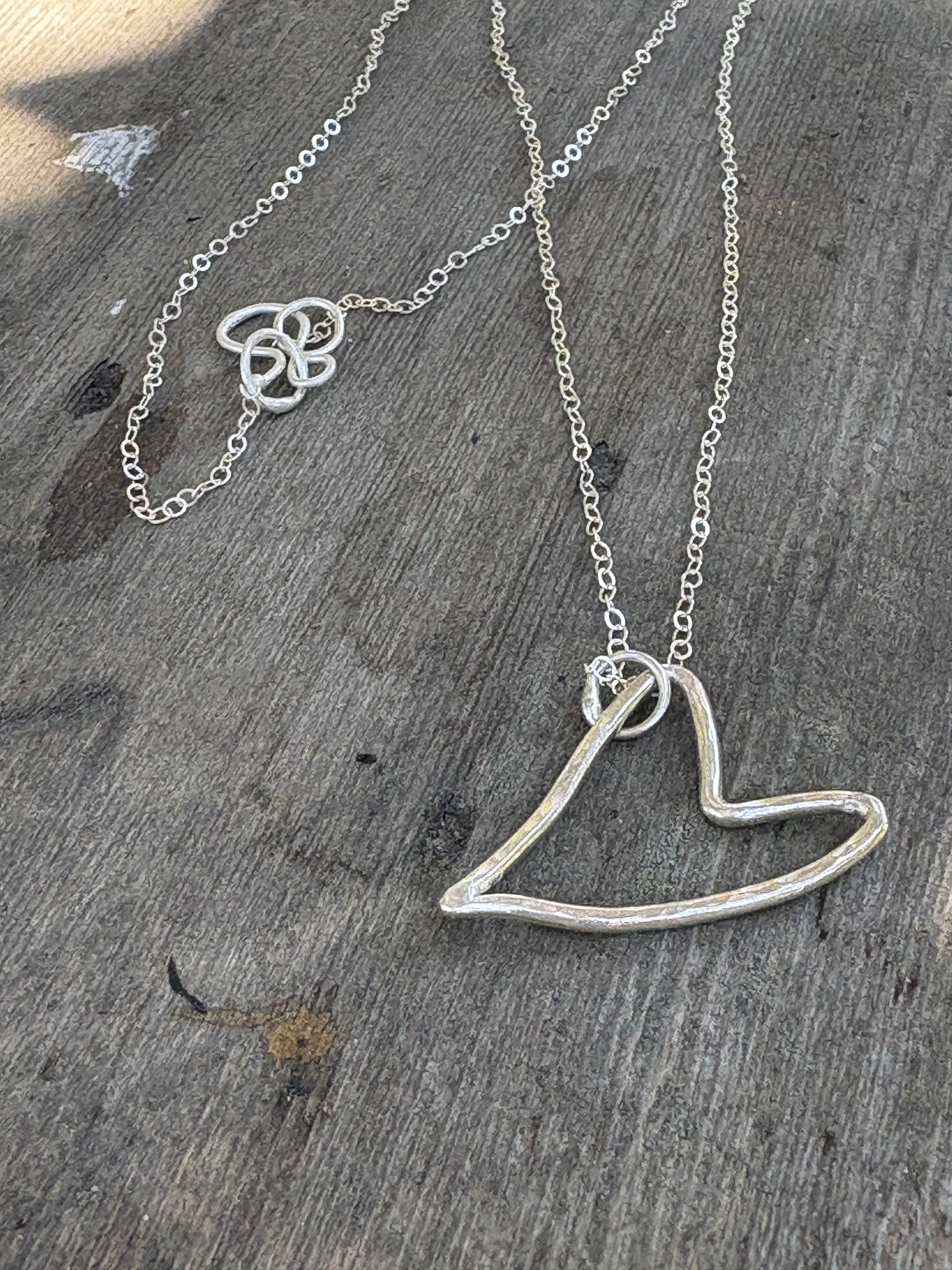 Floating heart charm necklace